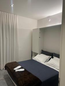 Postel nebo postele na pokoji v ubytování B&B Relax Rooms - Villa Murari Brà