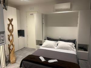 Postel nebo postele na pokoji v ubytování B&B Relax Rooms - Villa Murari Brà