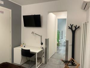 TV a/nebo společenská místnost v ubytování B&B Relax Rooms - Villa Murari Brà