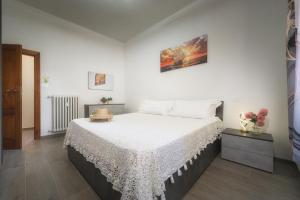 Postel nebo postele na pokoji v ubytování La Finestra su Guido Monaco