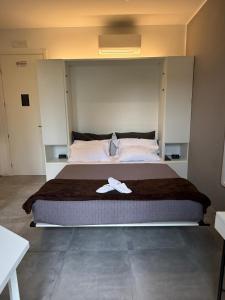 Postel nebo postele na pokoji v ubytování B&B Relax Rooms - Villa Murari Brà