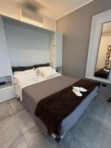 Postel nebo postele na pokoji v ubytování B&B Relax Rooms - Villa Murari Brà
