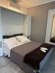 Postel nebo postele na pokoji v ubytování B&B Relax Rooms - Villa Murari Brà