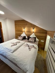 Postel nebo postele na pokoji v ubytování Ferienwohnung Fernblick + 37 fotografií
