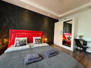 Posteľ alebo postele v izbe v ubytovaní Apartament Centrum Chmielna 73c