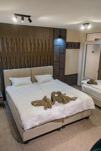 Postel nebo postele na pokoji v ubytování Binta HOSTEL