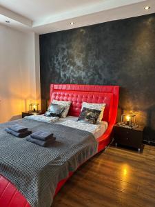 Posteľ alebo postele v izbe v ubytovaní Apartament Centrum Chmielna 73c