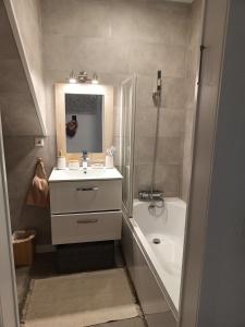 a bathroom with a sink and a shower and a tub at Casa La Paz in Genalguacil +40 photos
