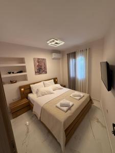 Кровать или кровати в номере Andry's Slow Living in the heart of Lefkada by 8essentially