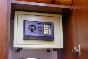 a control panel for a toilet in a bathroom at Hotel Odissey Jaz in Budva