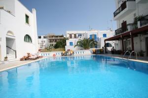 a large swimming pool in the middle of a building at Iliovasilema in Naxos Chora
