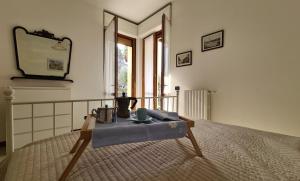 Postel nebo postele na pokoji v ubytování Villa gli Ulivi - Calafate Lake & Mountain View