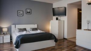 Giường trong phòng chung tại Wczasowa, Sun & Snow