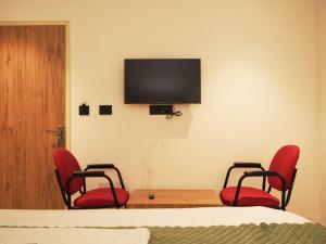 TV a/nebo společenská místnost v ubytování Hotel Star City Delhi -Free Airport Pickup