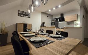 a dining room table with wine glasses on it at Harpener Hellweg 457 in Bochum