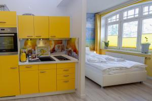Kuchyň nebo kuchyňský kout v ubytování Villa Sirene - Wohnung 08