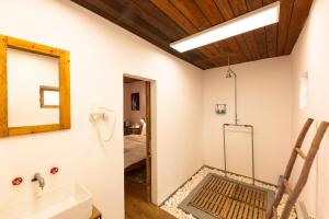 a bathroom with a mirror and a sink at Critz Cross in Criţ +34 photos