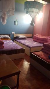 Postel nebo postele na pokoji v ubytování Everst hotel