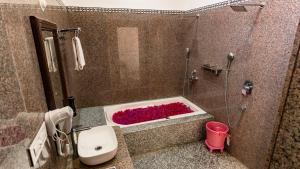 Vannituba majutusasutuses Sand castle resort and villa