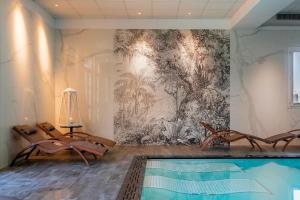Bazén v ubytování Hotel Formula Int. & Puravita SPA nebo v jeho okolí