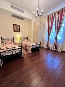 Postel nebo postele na pokoji v ubytování Park Villa - Boutique Hotel