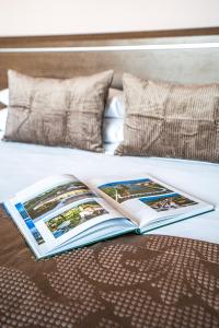 Postel nebo postele na pokoji v ubytování Hotel Formula Int. & Puravita SPA