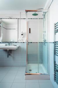 Koupelna v ubytování Hotel Formula Int. & Puravita SPA