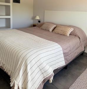 Postel nebo postele na pokoji v ubytování 3H MALARGUE Duplex I