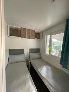 Camping Bella Vista客房内的一张或多张床位
