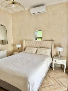Postel nebo postele na pokoji v ubytování Grande Casa - Central Stellenbosch