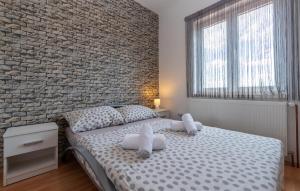 Posteľ alebo postele v izbe v ubytovaní Pet Friendly Home In Pridraga With Wifi