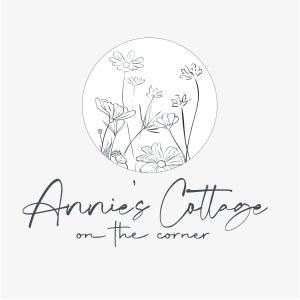 ananas coffee on the corner inscription and flowers in a circle at Annie's Cottage On The Corner in Donegal