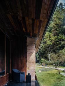 Um jardim no exterior de 景德镇行山世外东篱院民宿