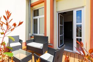 Posezení v ubytování Loft Apartments + 24 fotografií