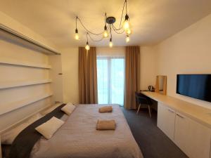 Postel nebo postele na pokoji v ubytování VIGEO lounge b&b coffee