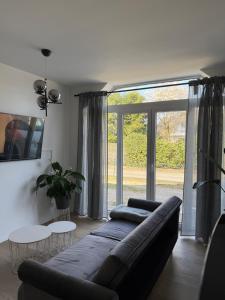 A seating area at Renovated in style - Close to Hamburg