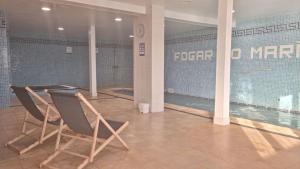 Bazén v ubytovaní Hotel Alda Fogar do Mariñeiro alebo v jeho blízkosti