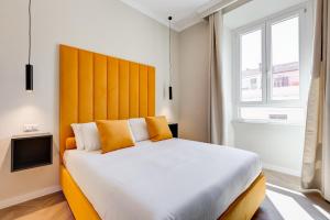 Postel nebo postele na pokoji v ubytování Dionigi 43 Private Suites by Premium Suites Collection