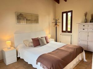 Posteľ alebo postele v izbe v ubytovaní Casa Arco
