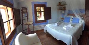 Posteľ alebo postele v izbe v ubytovaní Casa del Pastor-Brugarolas Village