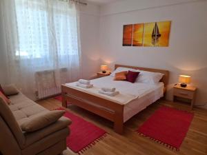 Posteľ alebo postele v izbe v ubytovaní Apartment Jolanka