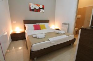 A bed or beds in a room at B&B Pietramare