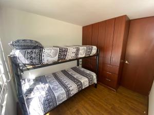 Postel nebo postele na pokoji v ubytování Apto en conjunto cerrado con piscina.