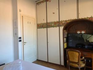 TV a/nebo společenská místnost v ubytování B&B Monte di Portofino