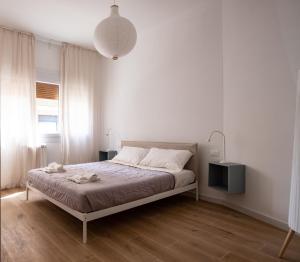 Ένα ή περισσότερα κρεβάτια σε δωμάτιο στο GuestHost - Casa Botero