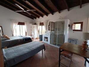 Posteľ alebo postele v izbe v ubytovaní The African House