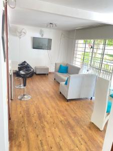 TV a/nebo společenská místnost v ubytování Apto en conjunto cerrado con piscina.
