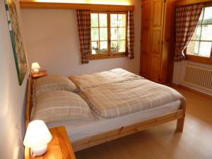 Postel nebo postele na pokoji v ubytování Chalet Charming
