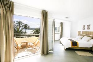 Postel nebo postele na pokoji v ubytování Moraira Beach 1