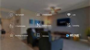 a bunch of icons on a wall in a room at Beautiful Condo Only 6 Minutes From Disney World in Kissimmee